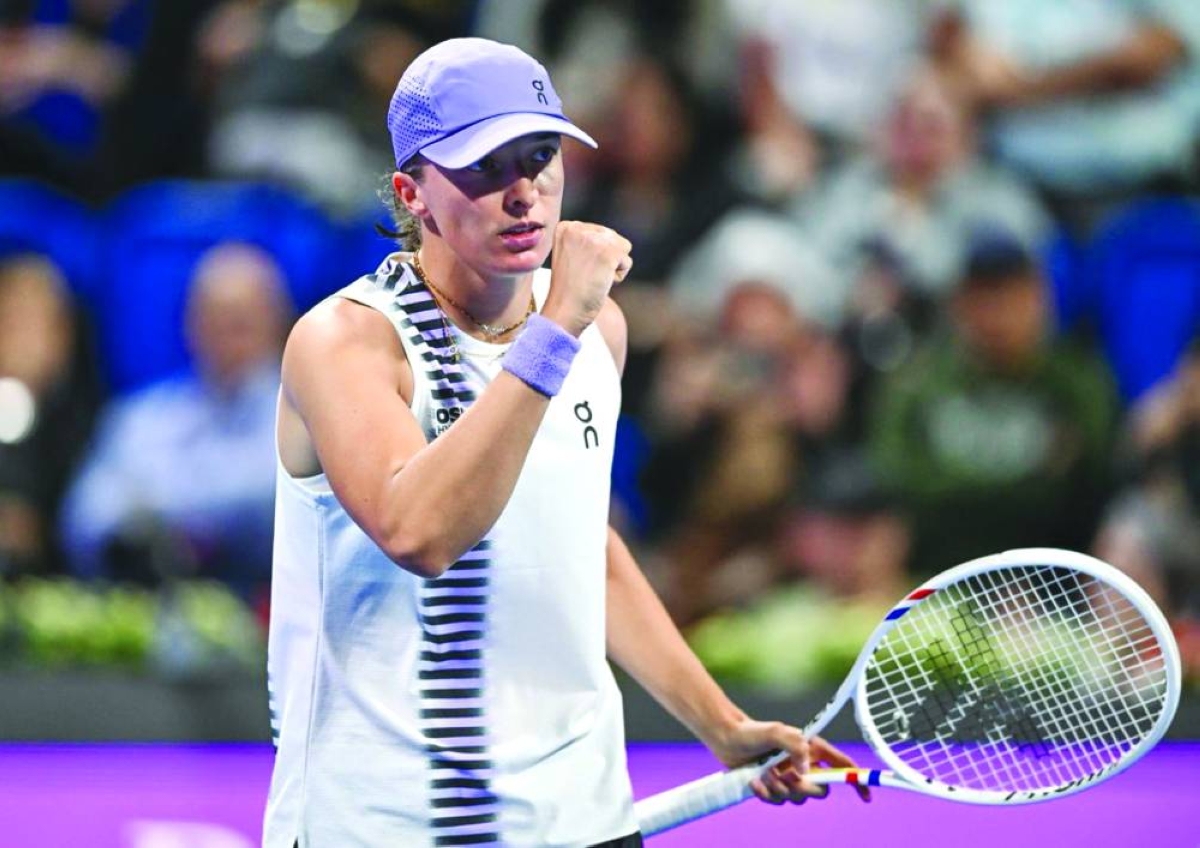 Iga Swiatek dropped just eight points in the first set as she brushed aside Indonesia's Janice Tjen 6-0, 6-3.