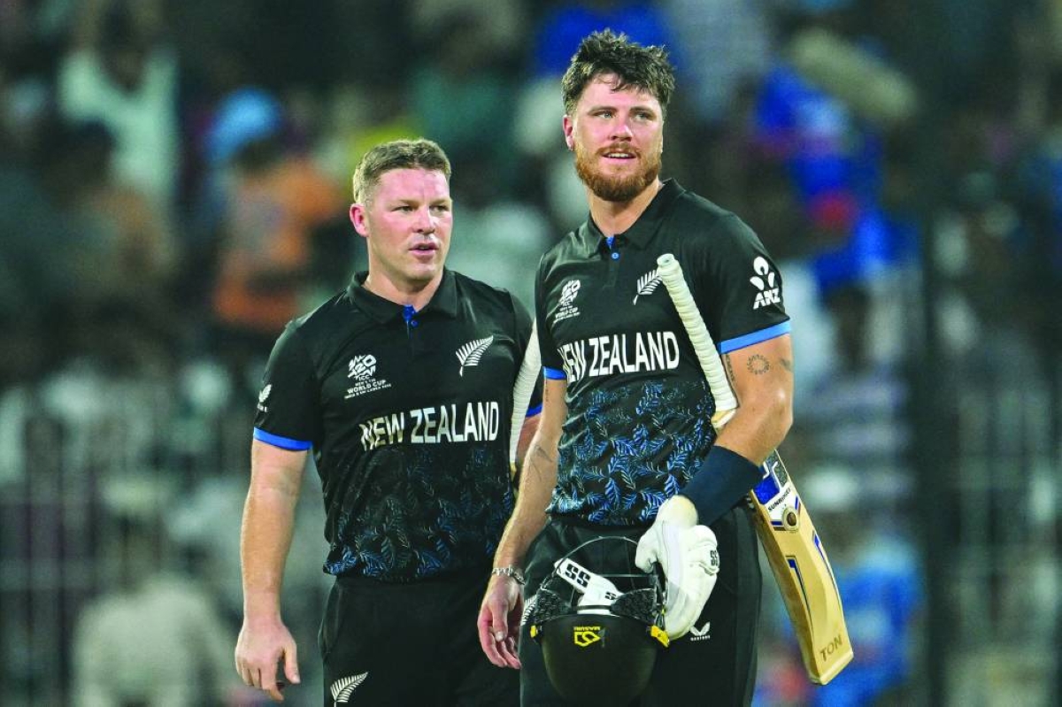 New Zealand’s Finn Allen (right) and Tim Seifert celebrate after their victory at the end of the World Cup match against the UAE in Chennai Tuesday. (AFP)
