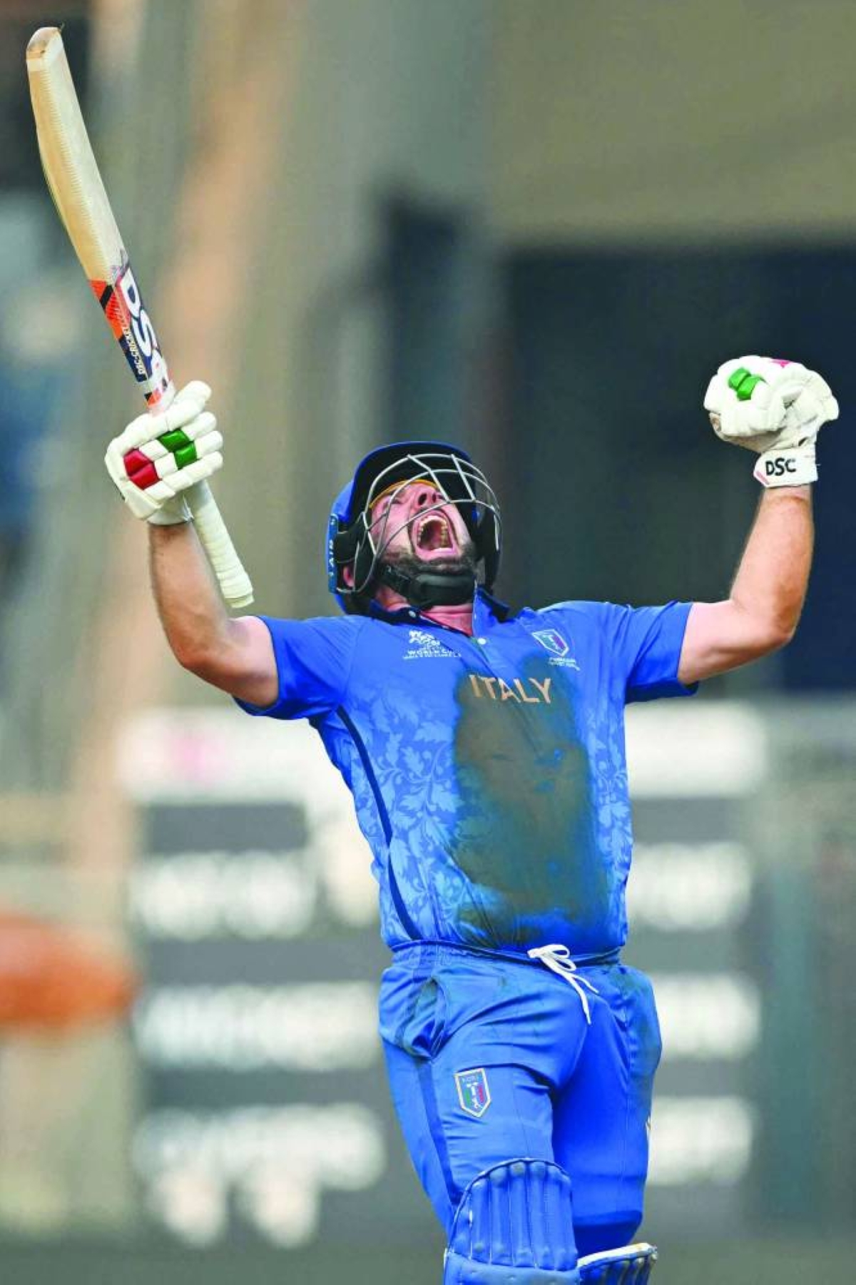 Italy's Anthony Mosca celebrates after winning the World Cup group stage match against Nepal at the Wankhede Stadium in Mumbai Thursday. (AFP)