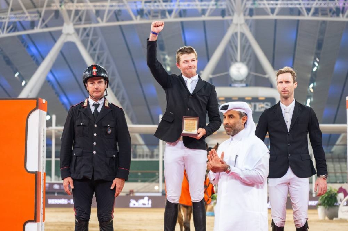 
Harry Charles celebrates with the trophy after winning the CSI5* 155cm Prix Hermes Sellier class, ahead of Italy’s Emanuele Gaudiano and Belgium’s Pieter Devos.