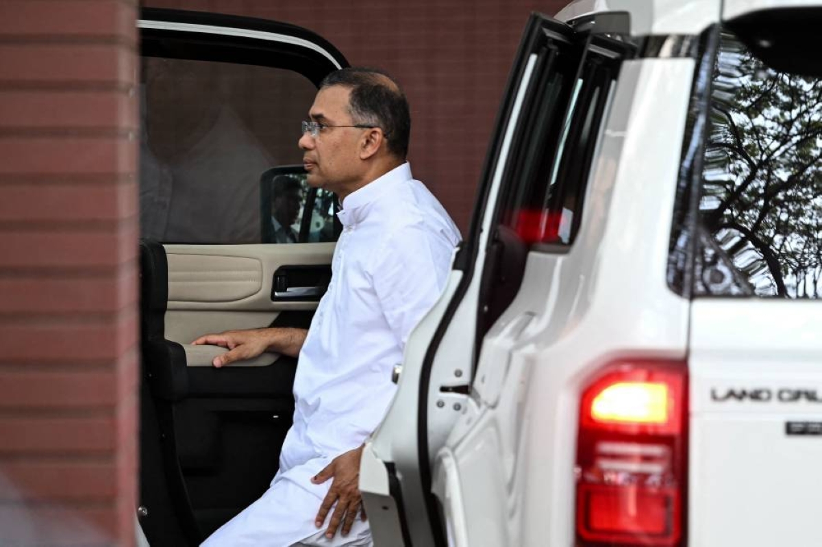 Bangladesh Nationalist Party (BNP) chairman and election candidate Tarique Rahman arrives at the party office in Dhaka on February 13, 2026. The Bangladesh Nationalist Party (BNP) claimed a thumping win on February 13 in the first elections held since a deadly 2024 uprising, with leader Tarique Rahman poised to become prime minister. (Photo by Sajjad HUSSAIN / AFP)