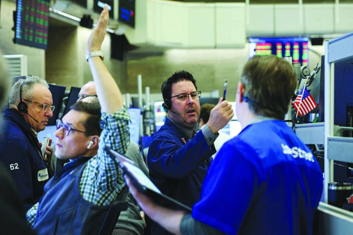 Traders work on the floor of the New York Stock Exchange. US stock investors will be on guard next week for further volatility induced by fears of artificial ‌intelligence disruption as they also assess the durability of a rotation beneath the market's surface, ​along with upcoming earnings from Walmart and ‌fresh economic data.