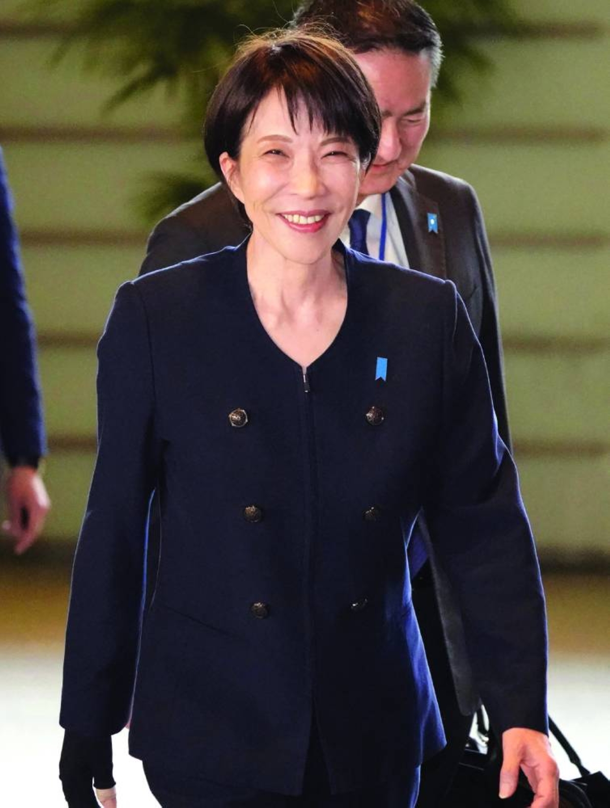 
Japan’s PM Sanae Takaichi smiles as she enters the Prime Minister’s Office in Tokyo earlier this week. (AFP) 