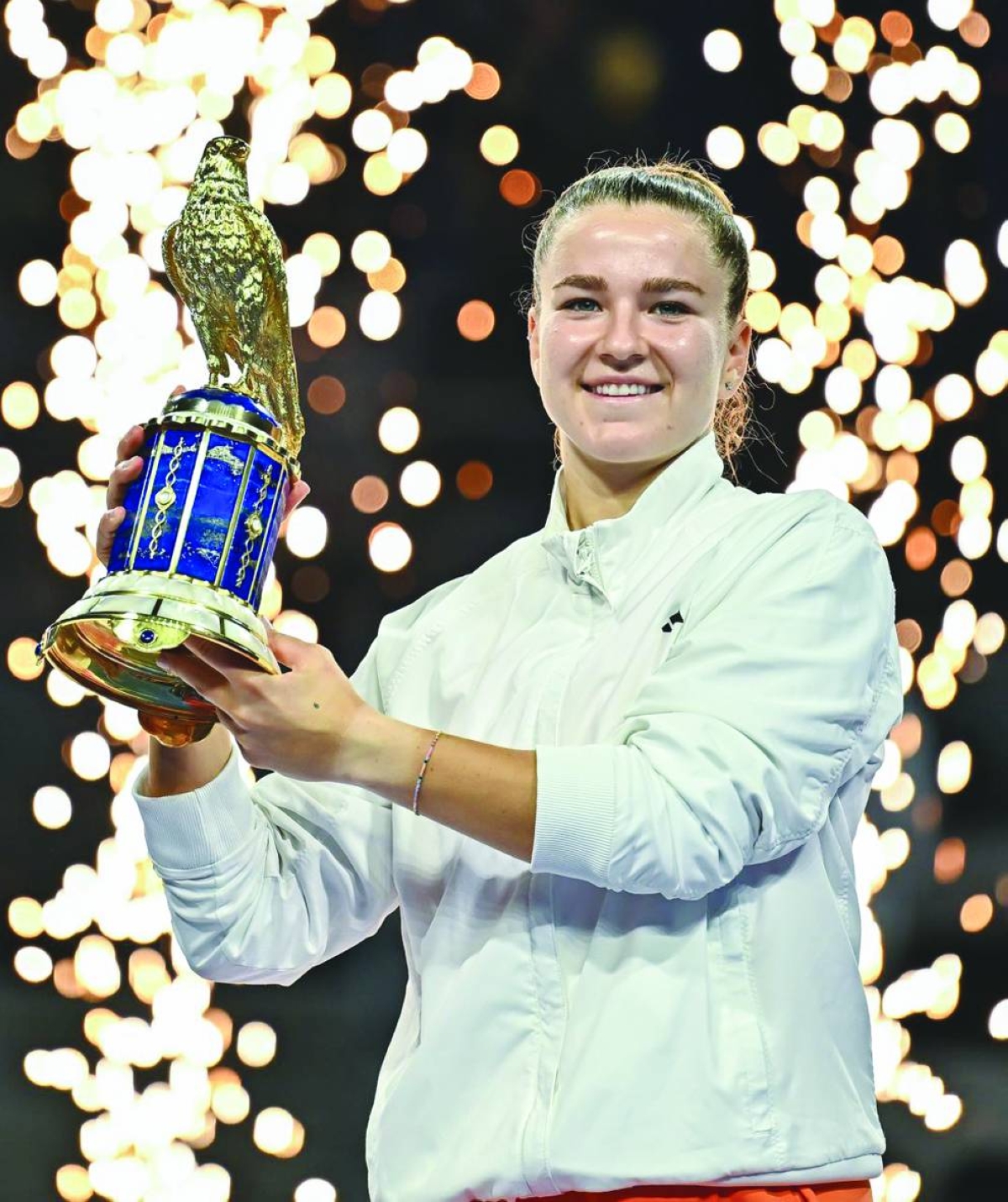 Karolina Muchova of the Czech Republic celebrates after ​she beat ‌Victoria Mboko of Canada 6-4 7-5 in ‌the Qatar TotalEnergies Open final.