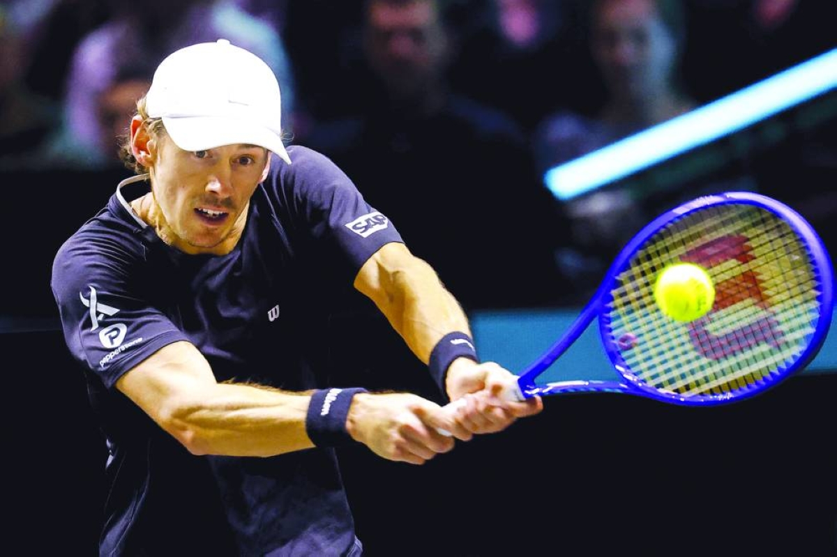 Australia's Alex de Minaur returns the ball to Canada's Felix Auger-Aliassime during the singles final Rotterdam tennis tournament in Ahoy Rotterdam on February 15, 2026. (AFP)