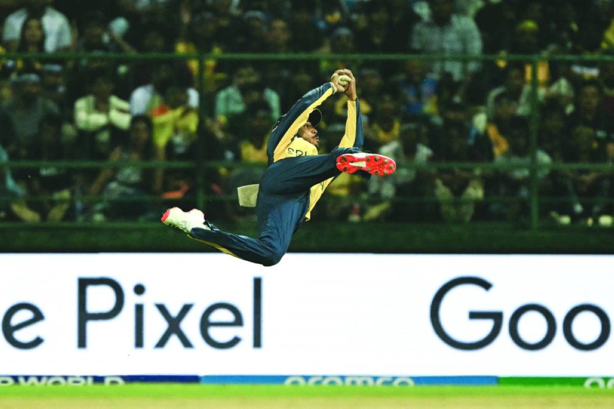 Sri Lanka's Pathum Nissanka takes a catch to dismiss Australia's Glenn Maxwell during the 2026 ICC Men's T20 Cricket World Cup group stage match between Australia and Sri Lanka at Pallekele International Cricket Stadium in Kandy on February 16, 2026. (AFP)