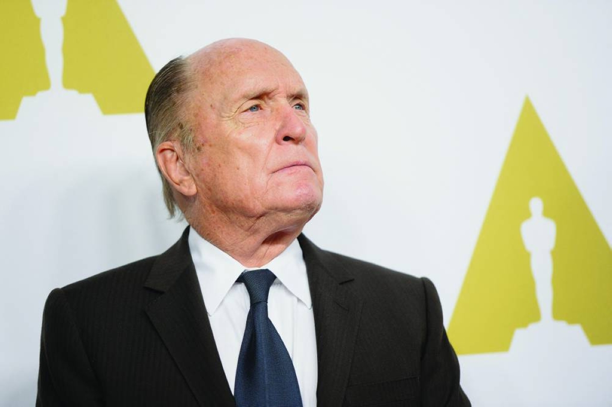 (FILES) Actor Robert Duvall arrives for the Oscars Nominees' Luncheon hosted by the Academy of Motion Picture Arts and Sciences, February 2, 2015 at the Beverly Hilton Hotel in Beverly Hills, California. Robert Duvall, who played the smooth mafia lawyer in "The Godfather" and stole the show with his depiction of a surfing-crazed colonel in "Apocalypse Now," has died at the age of 95, his wife said on February 16, 2026. (AFP)