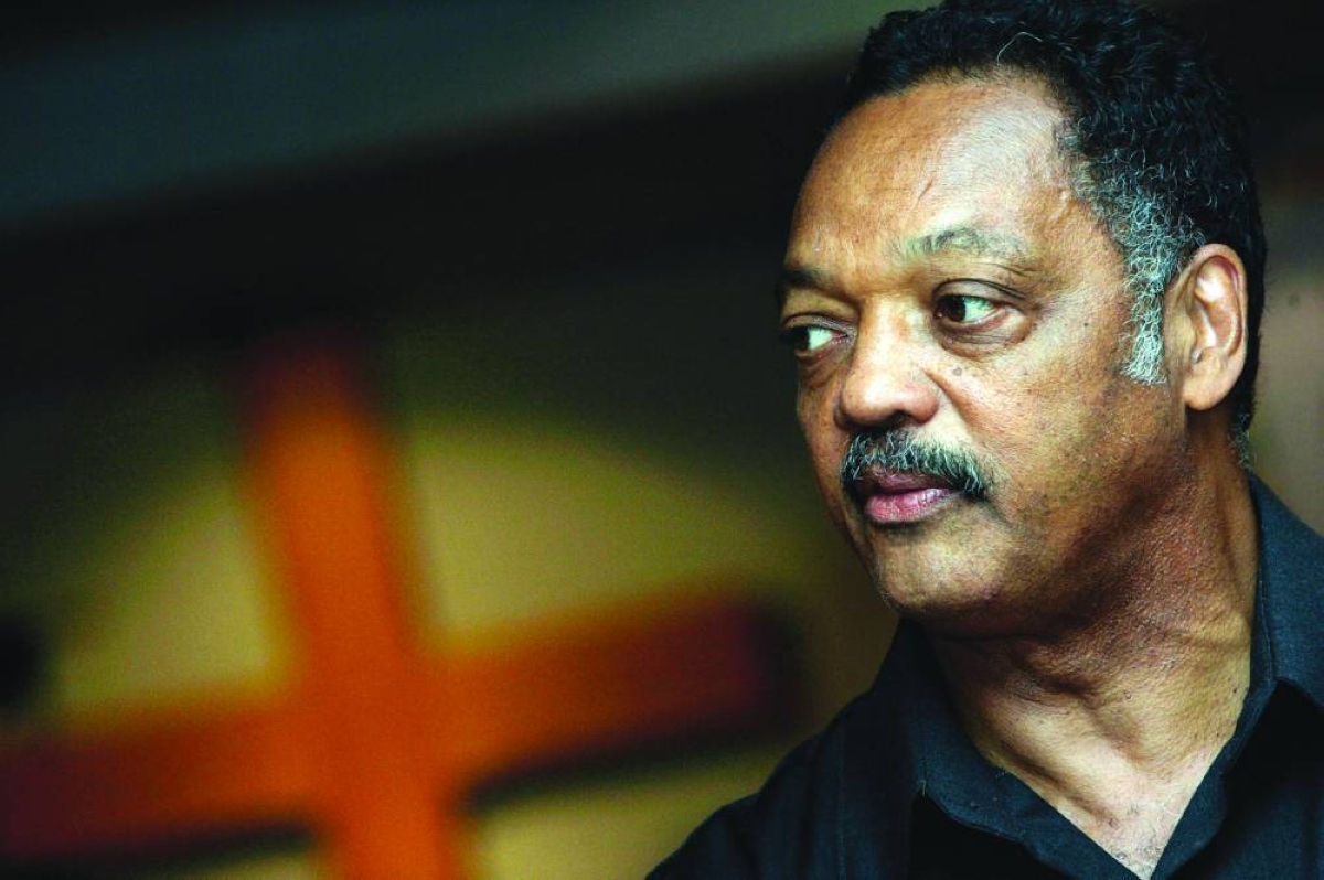(FILES) Civil rights activist and Former US presidencial election candidate reverend Jesse Jackson gives a press conference after bilateral talks with Molefe Tsele, General Secretary of the South African Council of Churches, in Johannesburg, 25 October 2005. Veteran US civil rights activist Reverend Jesse Jackson died on February 17, 2026, his family said in a statement. He was 84. (AFP)