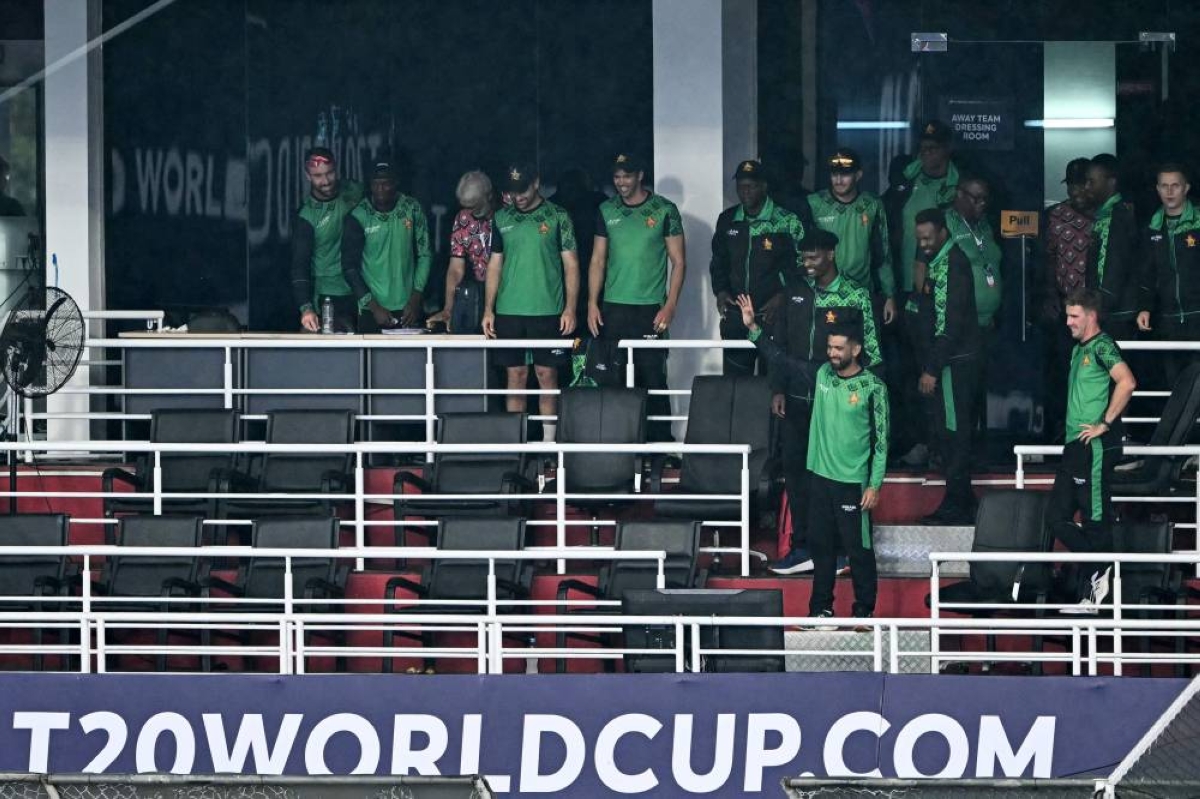 Zimbabwe's captain Sikandar Raza (front) waves to supporters after the 2026 ICC T20 World Cup group stage match against Ireland was called off due to rain at Pallekele International Cricket Stadium in Kandy on February 17, 2026. (AFP)