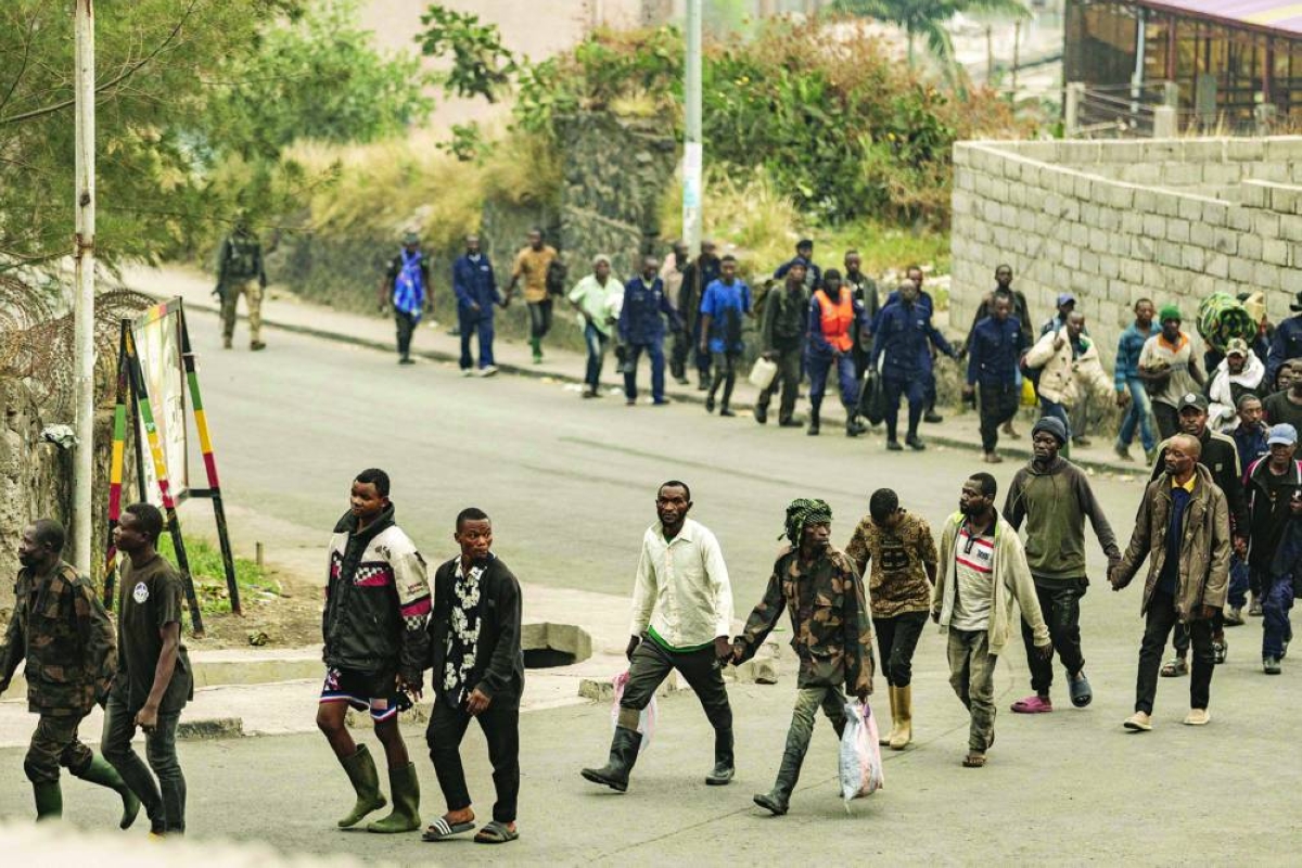 (FILES) Alleged members of the Congolese military, Wazalendo (Patriots in Swahili) militiamen, and other Congolese forces walk in line while being escorted by members of the M23 armed group in Goma on January 28, 2025. A year after the M23 armed group seized Goma, residents of the major city in eastern DRC are living in a "catastrophic" situation, according to the Congolese government spokesperson.
On January 26, 2025, a million residents were sheltering in their homes when the Congolese army and its allies abandoned the capital of North Kivu province. Hundreds of Rwandan soldiers, allied with the anti-government armed group M23, had just crossed the border and entered the lakeside city, at the cost of intense fighting that left thousands dead.
Felix Tshisekedi, his successor as the DRC's president, accuses Kabila of being the brains behind the armed group. (Photo by AFP)