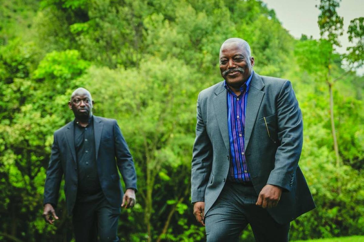(FILES) Former President of the Democratic Republic of Congo Joseph Kabila (R) walks back into his house after posing for a group photo with religious leaders at one of his residences in Goma on May 29, 2025. A year after the M23 armed group seized Goma, residents of the major city in eastern DRC are living in a "catastrophic" situation, according to the Congolese government spokesperson.
On January 26, 2025, a million residents were sheltering in their homes when the Congolese army and its allies abandoned the capital of North Kivu province. Hundreds of Rwandan soldiers, allied with the anti-government armed group M23, had just crossed the border and entered the lakeside city, at the cost of intense fighting that left thousands dead.
Felix Tshisekedi, his successor as the DRC's president, accuses Kabila of being the brains behind the armed group. (Photo by Jospin Mwisha / AFP)