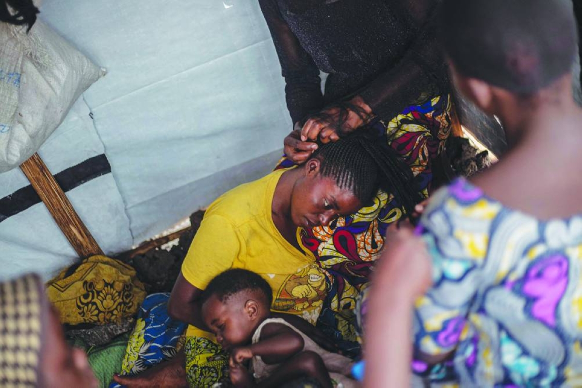 (FILES) Newly arrived people form the Masisi territory gather in the  Bulengo displaced persons camp, near Goma, North-Kivu province, on January 15, 2025. A year after the M23 armed group seized Goma, residents of the major city in eastern DRC are living in a "catastrophic" situation, according to the Congolese government spokesperson.
On January 26, 2025, a million residents were sheltering in their homes when the Congolese army and its allies abandoned the capital of North Kivu province. Hundreds of Rwandan soldiers, allied with the anti-government armed group M23, had just crossed the border and entered the lakeside city, at the cost of intense fighting that left thousands dead.
Felix Tshisekedi, his successor as the DRC's president, accuses Kabila of being the brains behind the armed group. (Photo by Jospin Mwisha / AFP)