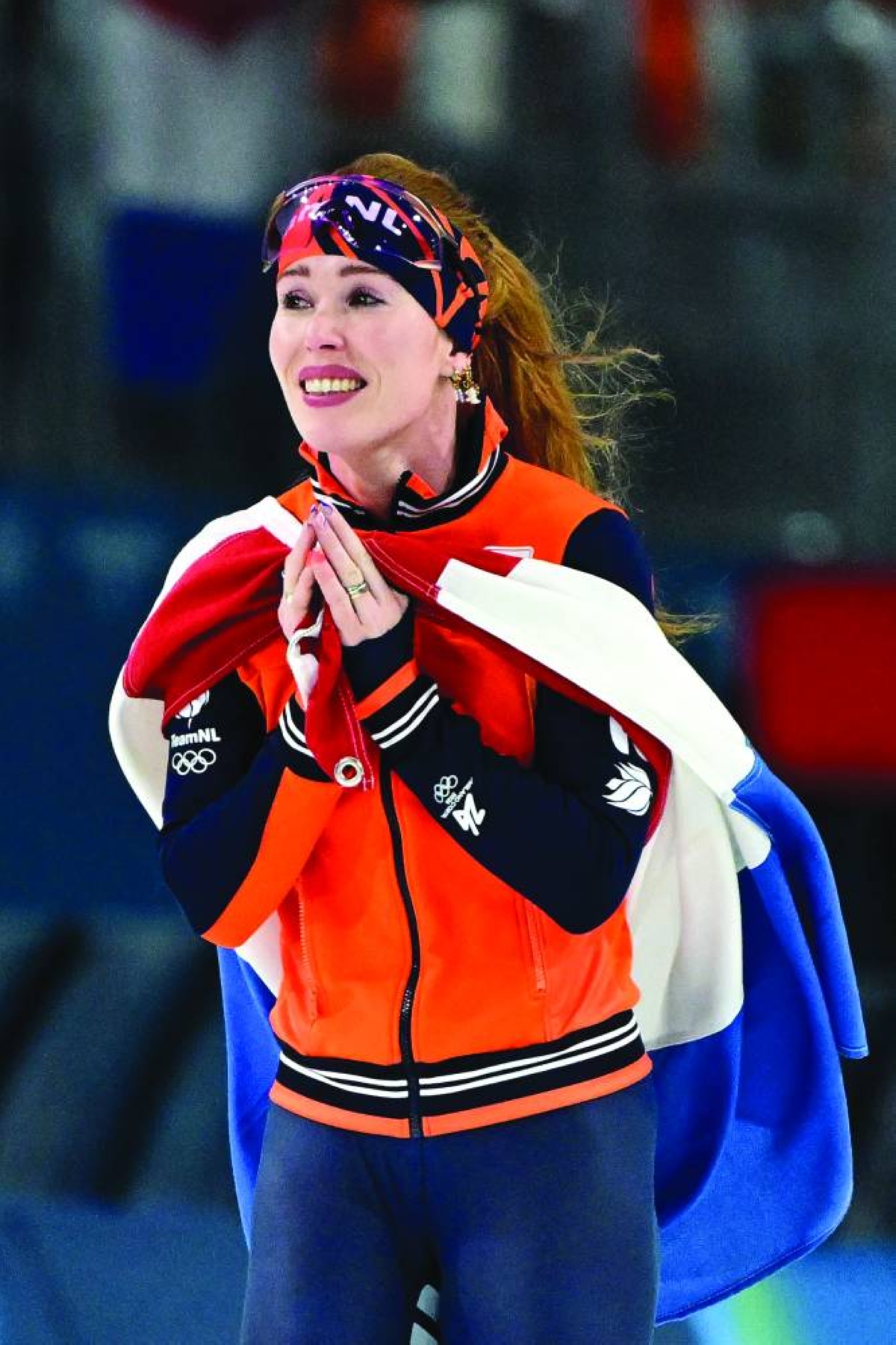 Netherlands' Antoinette Rijpma - de Jong celebrates after winning gold in the speed skating women's 1500m during the Milano Cortina 2026 Winter Olympic Games at Milano Speed Skating Stadium in Milan on February 20, 2026. (Photo by Piero CRUCIATTI / AFP)