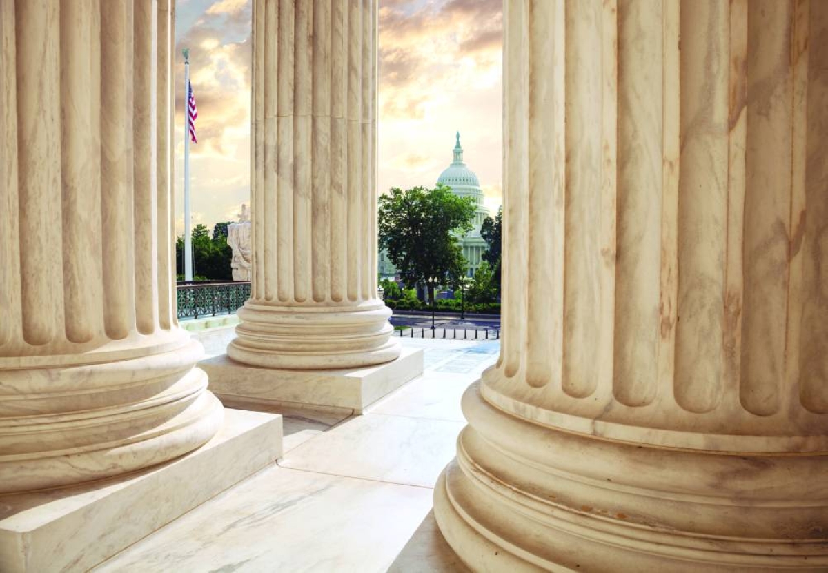 The US Capitol building seen between columns of the Supreme Court at sunset. Oil market shrugged off a US Supreme Court decision ruling unconstitutional Trump's use of a law to levy tariffs in national emergencies. 
PICTURE: Abdullah bin Hamad Al-Attiyah International Foundation for Energy and Sustainable Development.