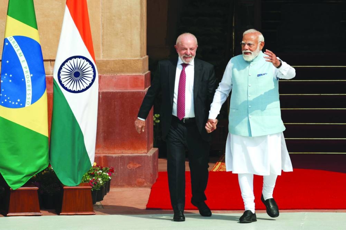 Indian Prime Minister Narendra Modi interacts with Brazilian President Luiz Inacio Lula da Silva, ahead of their meeting at Hyderabad House in New Delhi on Saturday. Brazil is among the world's top producers of ​iron ore and holds large reserves of minerals critical to steelmaking. Closer cooperation is expected to improve India's access to raw materials and technologies ‌needed to sustain long-term ⁠growth in its steel ​sector, an Indian government statement said.