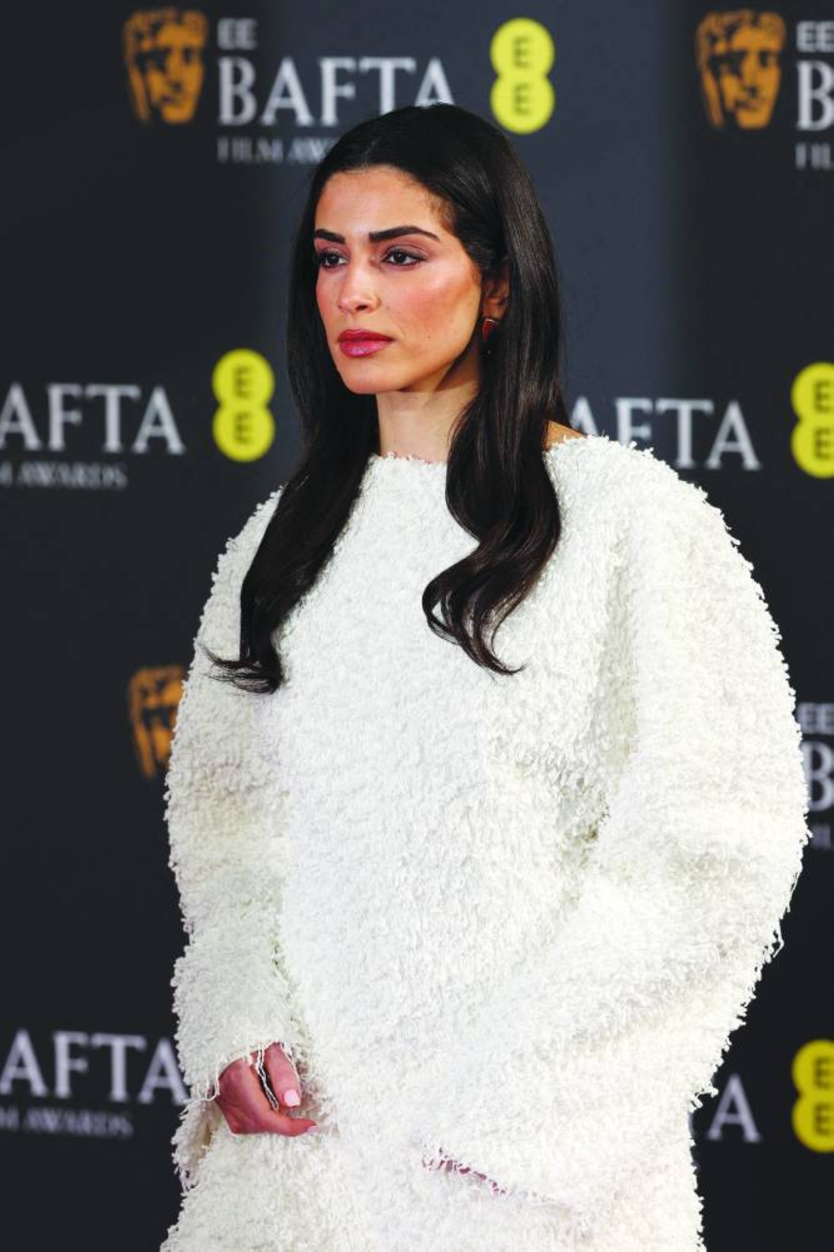 Jordanian/Palestinian/Canadian actress and spoken word poet Saja Kilani poses on the red carpet upon arrival at the Bafta awards at the Royal Festival Hall, Southbank Centre, in London, Sunday. (AFP)