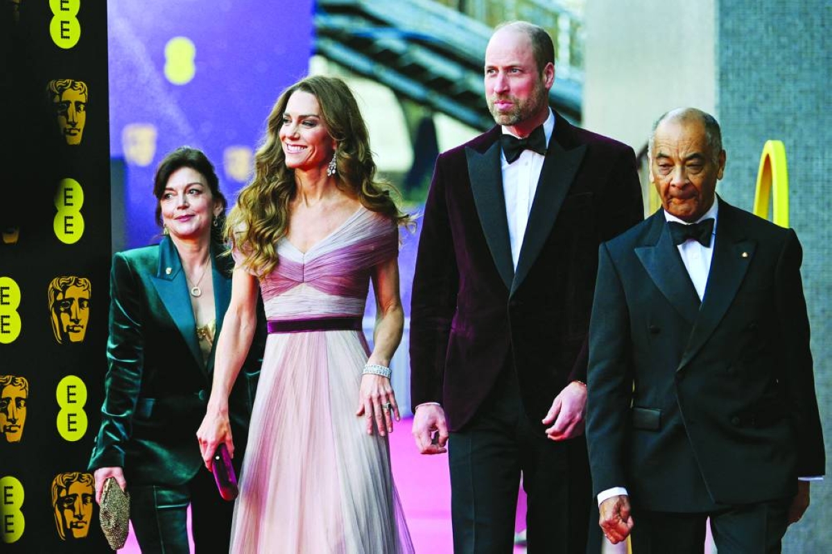 Britain's William, Prince of Wales, and Catherine, Princess of Wales, arrive with Jane Millichip, CEO of the British Academy of Film and Television Arts, and Lord-Lieutenant of Greater London Ken Olisa to the Bafta Film Awards 2026, at the Royal Festival Hall, Southbank Centre, in London, Britain, Sunday. (Reuters)