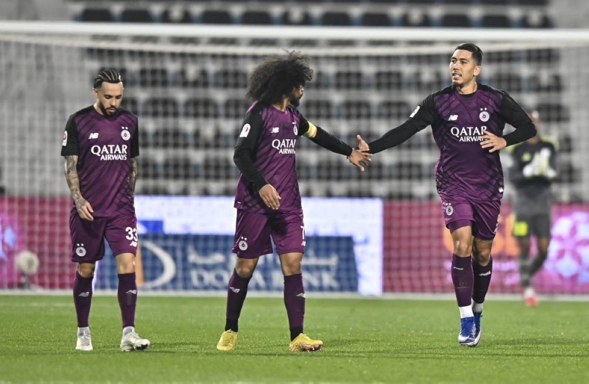 Al Sadd's Roberto Firmino (right) celebrates with Akram Afif after scoring against Al Wakrah at the Saoud Bin Abdulrahman Stadium. PICTURES: 
Noushad Thekkayil