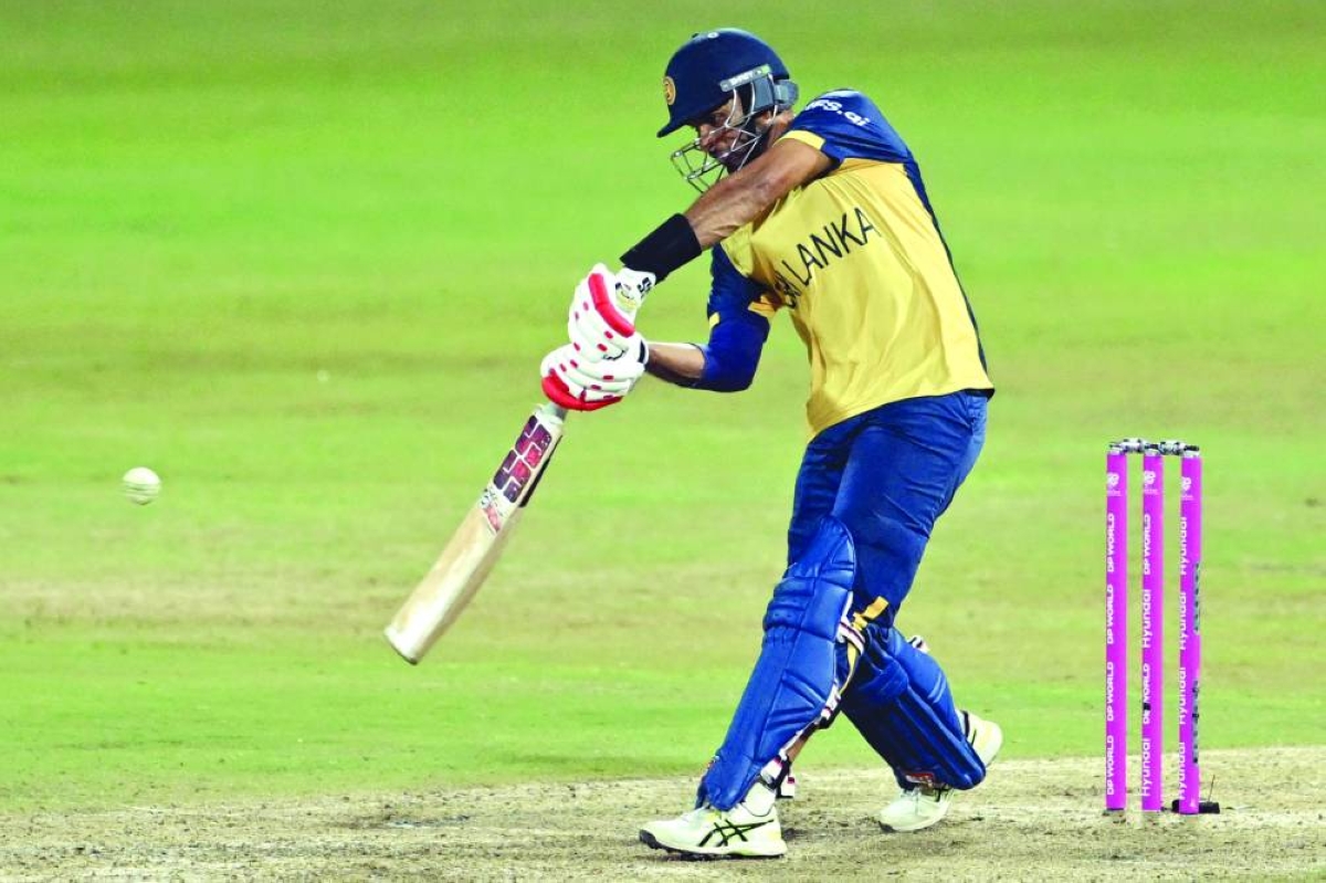 Sri Lanka’s captain Dasun Shanaka plays a shot against Pakistan at Pallekele International Cricket Stadium in Kandy Saturday. (AFP)