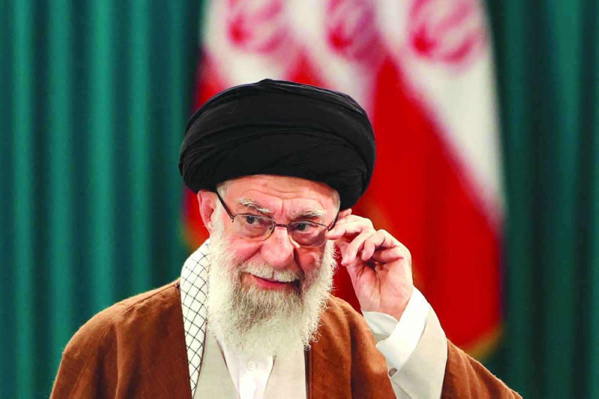 (FILES) Iran's Supreme Leader Ayatollah Ali Khamenei adjusts his eyeglasses during a press conference after casting his ballot for the parliamentary runoff elections in Tehran on May 10, 2024. US President Donald Trump announced on February 28, 2026, that Iran's supreme leader Ali Khamenei is confirmed dead. The United States and Israel launched strikes against Iran on February 28, with Israel's public broadcaster reporting that the Iranian supreme leader had been targeted, as the Islamic republic retaliated with barrages of missiles at Gulf states and Israel. (AFP)