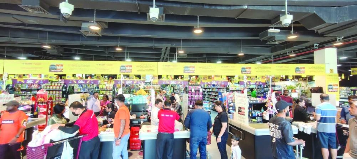 Shoppers at a busy hypermarket in Old Airport Area Saturday.