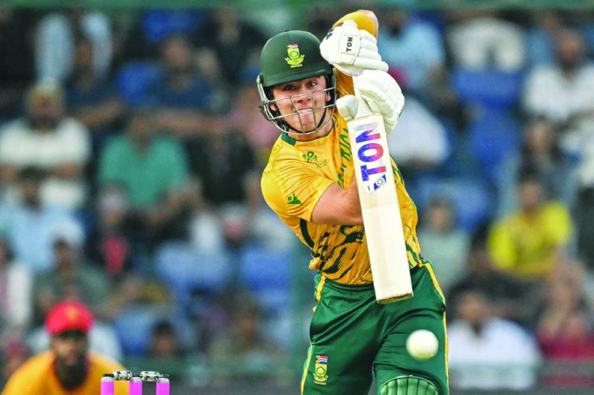 South Africa’s Dewald Brevis plays a shot during the World Cup Super Eight match against Zimbabwe in New Delhi Sunday. (AFP)