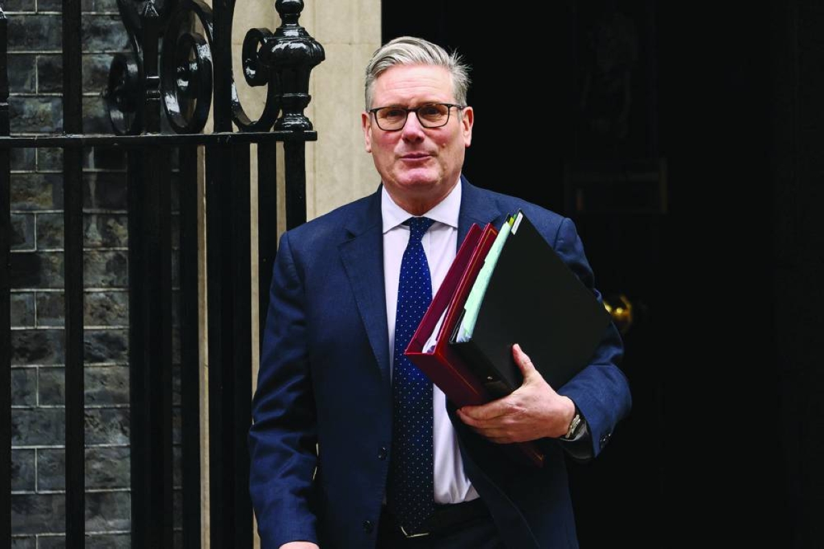 British Prime Minister Keir Starmer walks outside 10 Downing Street in London, Wednesday.