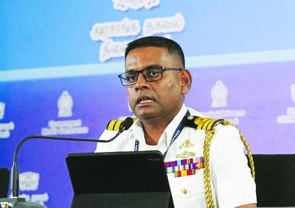 Sri Lankan Navy media spokesman Commander Buddhika Sampath speaks during a press conference at the Government Information Department after the rescue of people from the Iranian military ship Iris Dena that was attacked from submarine off Sri Lanka, in Colombo, yesterday.