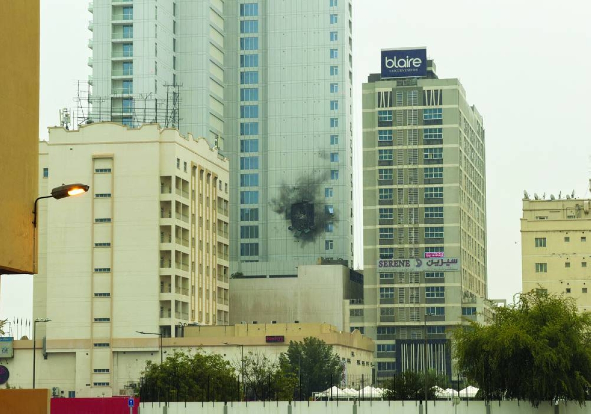 Damage caused by an Iranian drone strike at one of the buildings next to the headquarters of the U.S. Navy 5th Fleet in Juffair, Bahrain, March 4, 2026. REUTERS