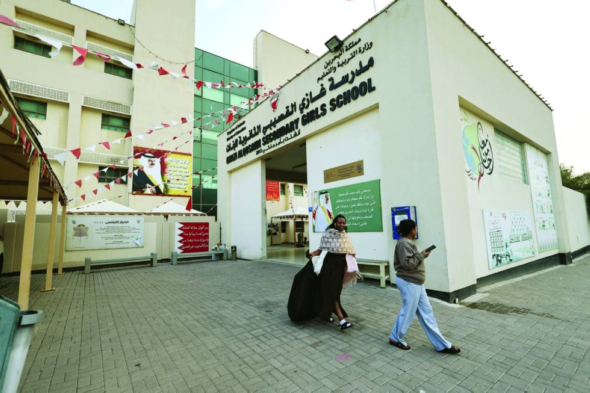 Evacuees, who are Nigerian nationals, walk at a government provided shelter for people living near the U.S. Navy Base and escaping high-rise buildings to be at a safe place from Iranian drone attacks, at Ghazi Al Gosaibi Secondary Girls School in Hamad Town, Bahrain, March 4, 2026. REUTERS