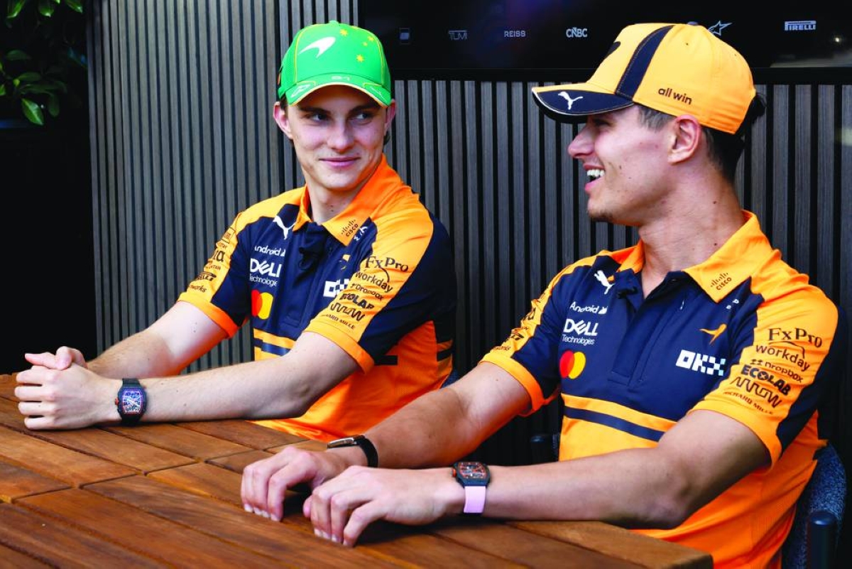 Formula One F1 - Australian Grand Prix - Albert Park Grand Prix Circuit, Melbourne, Australia - March 5, 2026
McLaren's Oscar Piastri with Lando Norris ahead of the Australian Grand Prix REUTERS/Hollie Adams