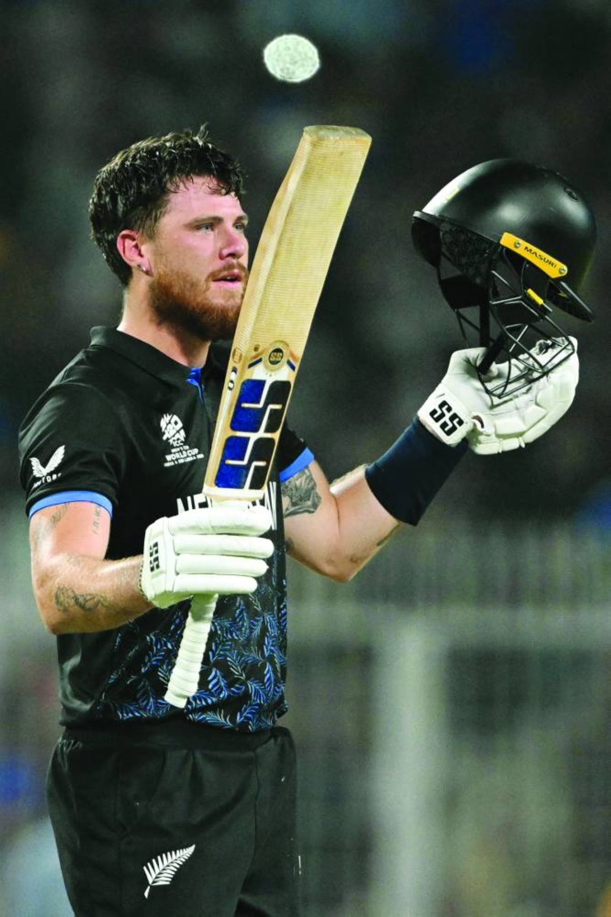 New Zealand's Finn Allen celebrates after scoring a century (100 runs) in the end of the 2026 ICC Men's T20 Cricket World Cup semi-final match between New Zealand and South Africa at the Eden Gardens in Kolkata on March 4, 2026. (AFP)