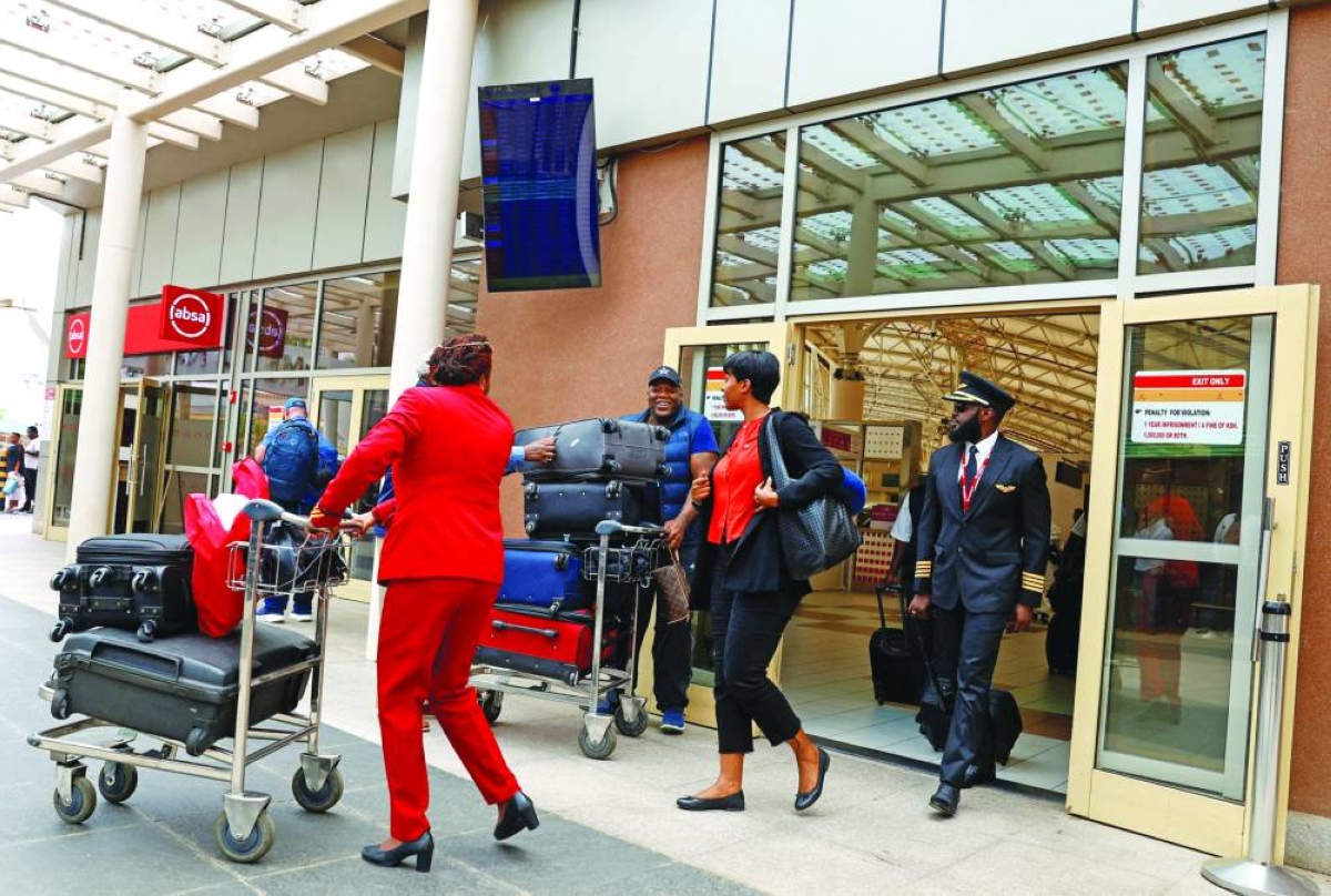 Fearful African migrants warily work on through Gulf missile strikes