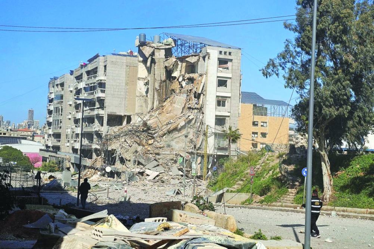 
Destruction is seen at the site of an Israeli airstrike that targeted the airport road that goes through Beirut’s southern suburbs. Lebanon was drawn into the Middle East war last week when Hezbollah attacked Israel in response to the killing of Iranian supreme leader Ayatollah Ali Khamenei during US-Israeli strikes. (AFP) 