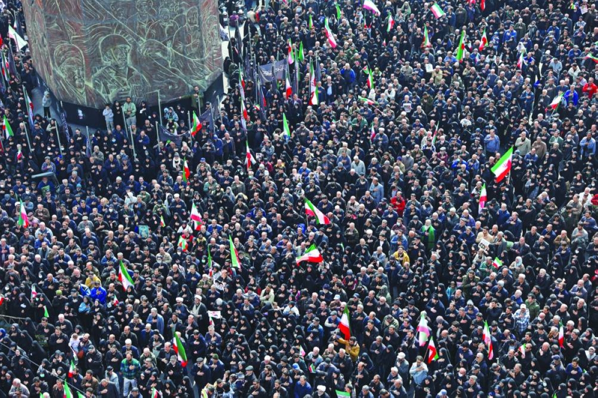People attend a funeral ceremony for the Iranian military commanders who were killed in strikes, amid the US-Israeli conflict with Iran, in Tehran, Wednesday. (Reuters)