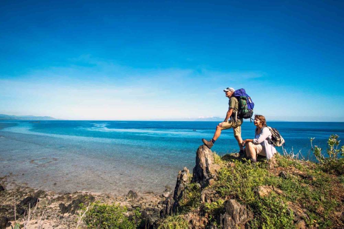 Tourists enjoy hiking amid breathtaking scenery