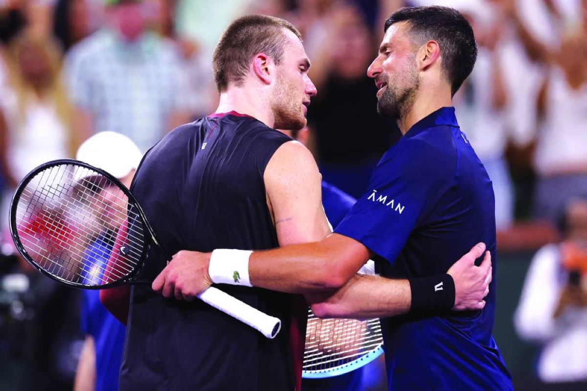 Jack Draper of Great Britain is congratulated by Novak Djokovic of Serbia after winning the Indian Wells Open match. (AFP)