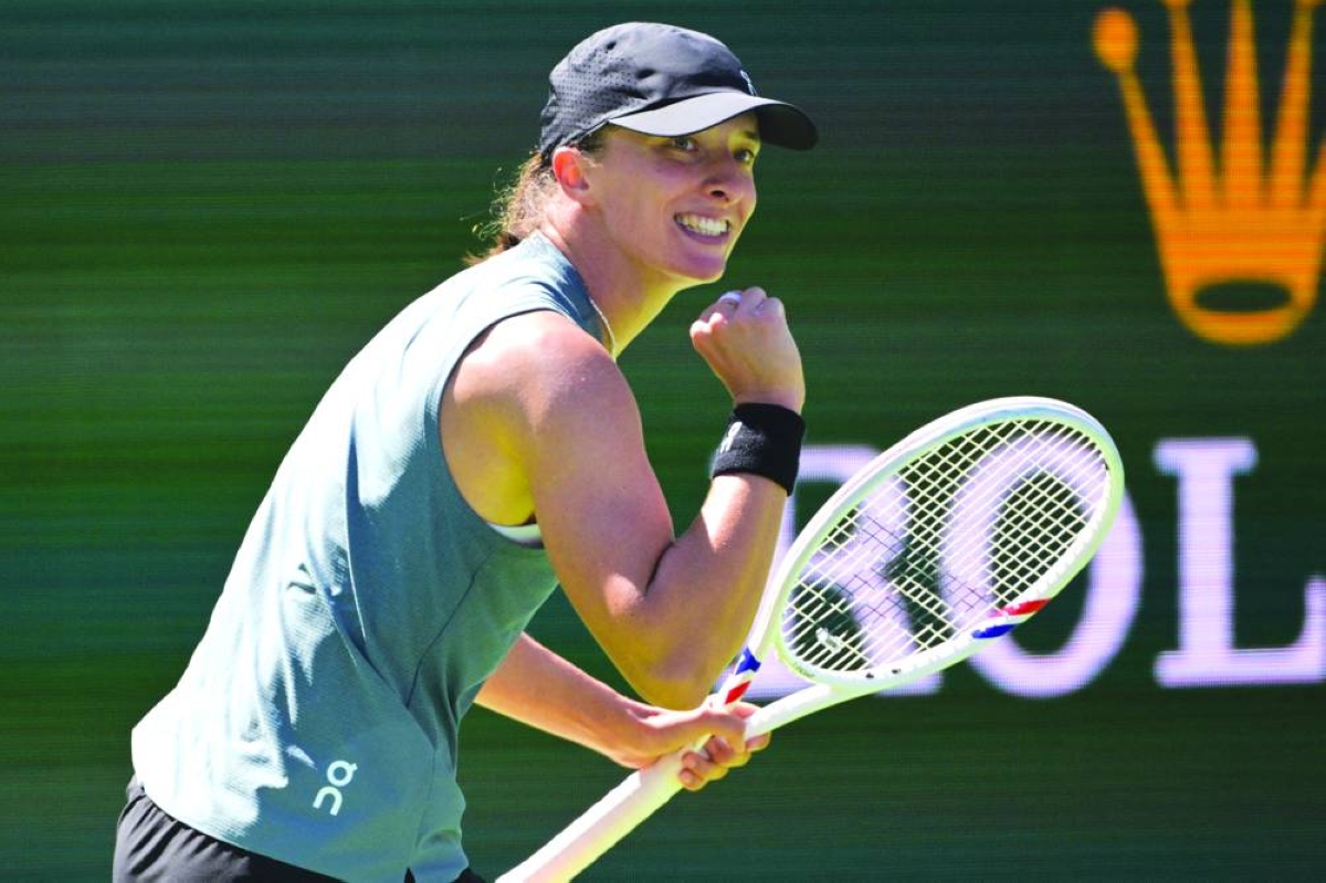 Iga Swiatek celebrates after winning against Karolina Muchova in the fourth round of the Indian Wells Open. (Jayne Kamin-Oncea-Imagn Images)