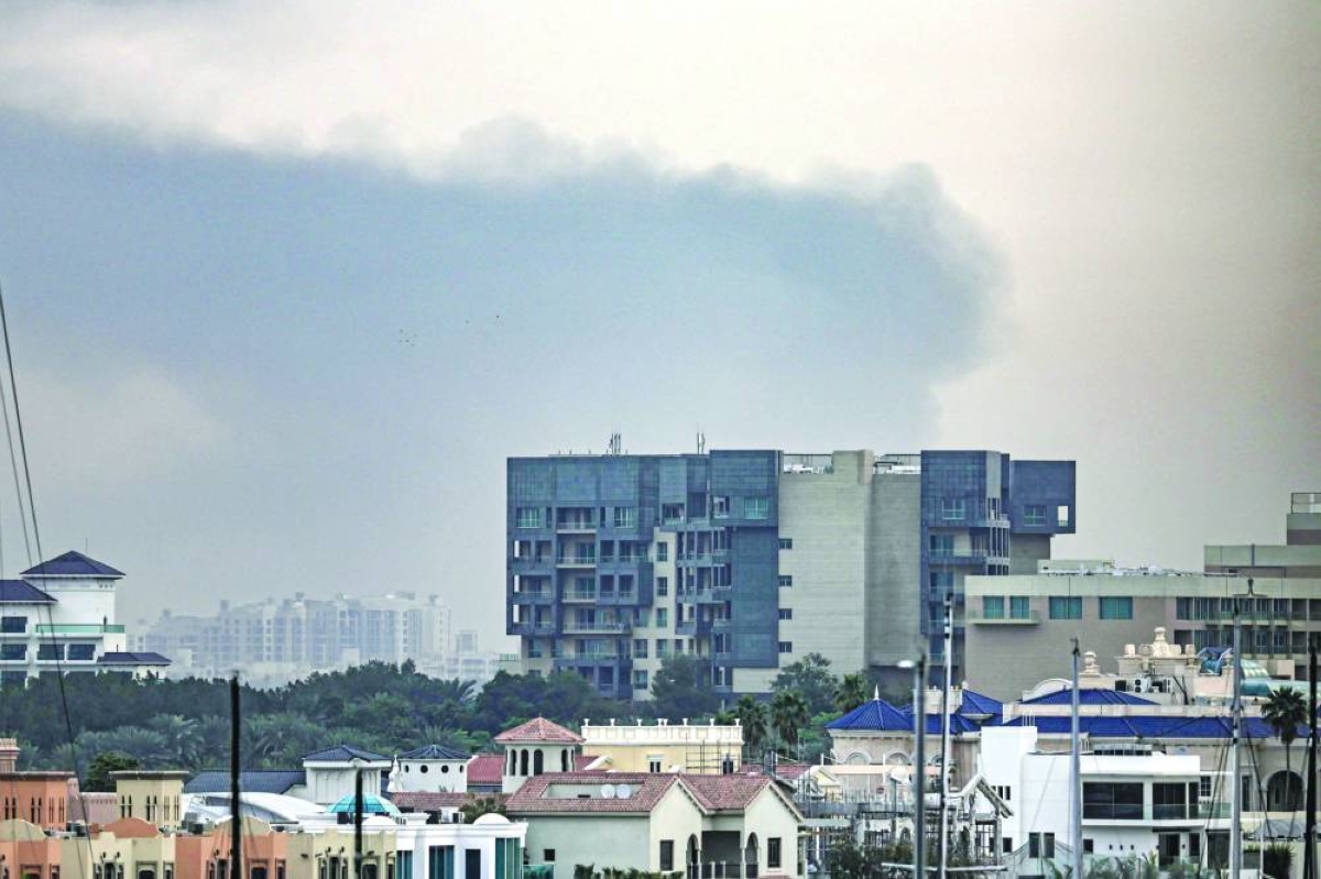 
Smoke rises above Dubai, yesterday. (AFP) 