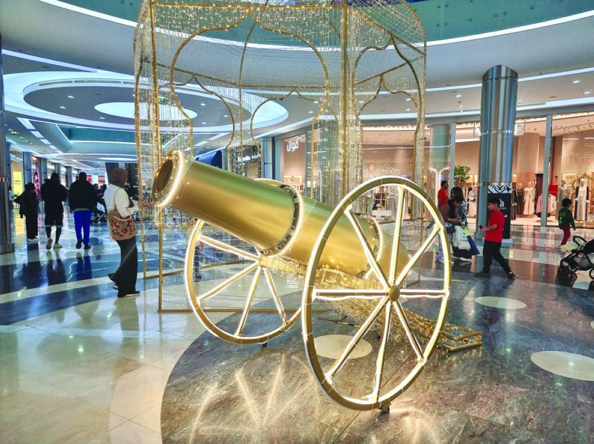 A festive Ramadan decoration displayed inside a shopping mall attracts visitors as footfall increases with shoppers completing their Eid al-Fitr preparations. PICTURE: Joey Aguilar