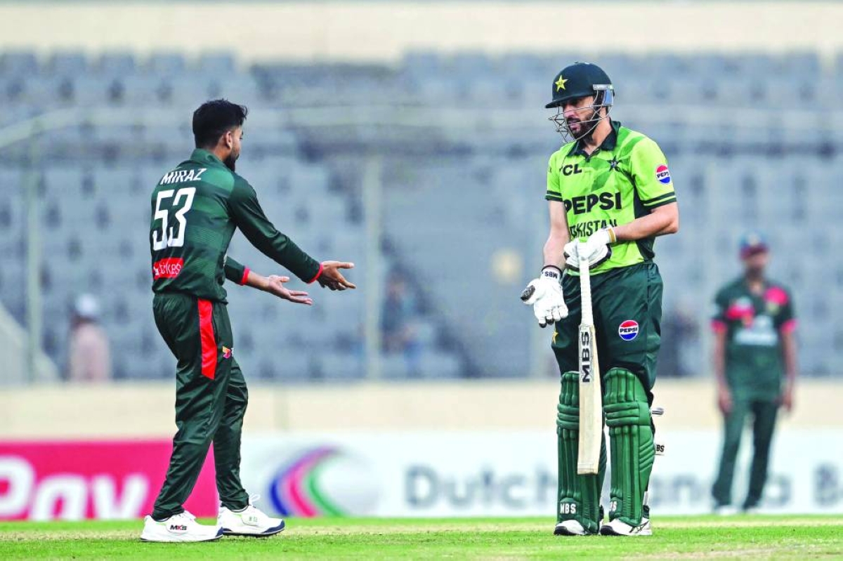 
Pakistan’s Salman Agha (right) speaks with Bangladesh’s captain Mehidy Hasan Miraz after his dismissal during the second ODI at Sher-e-Bangla National Stadium in Mirpur on Friday. (AFP) 