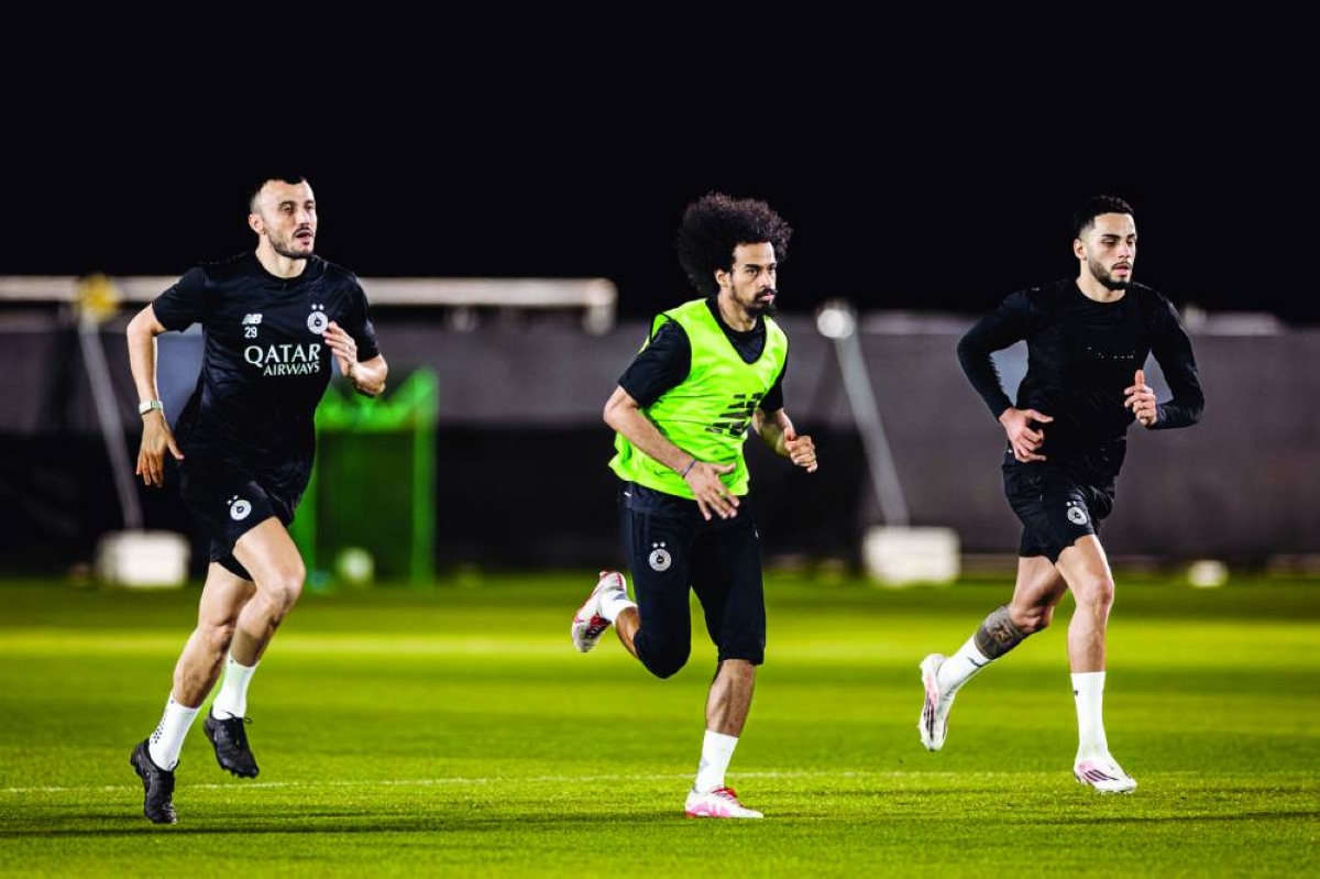 Al Sadd players train on the eve of their Qatar Stars League match against Al Arabi.