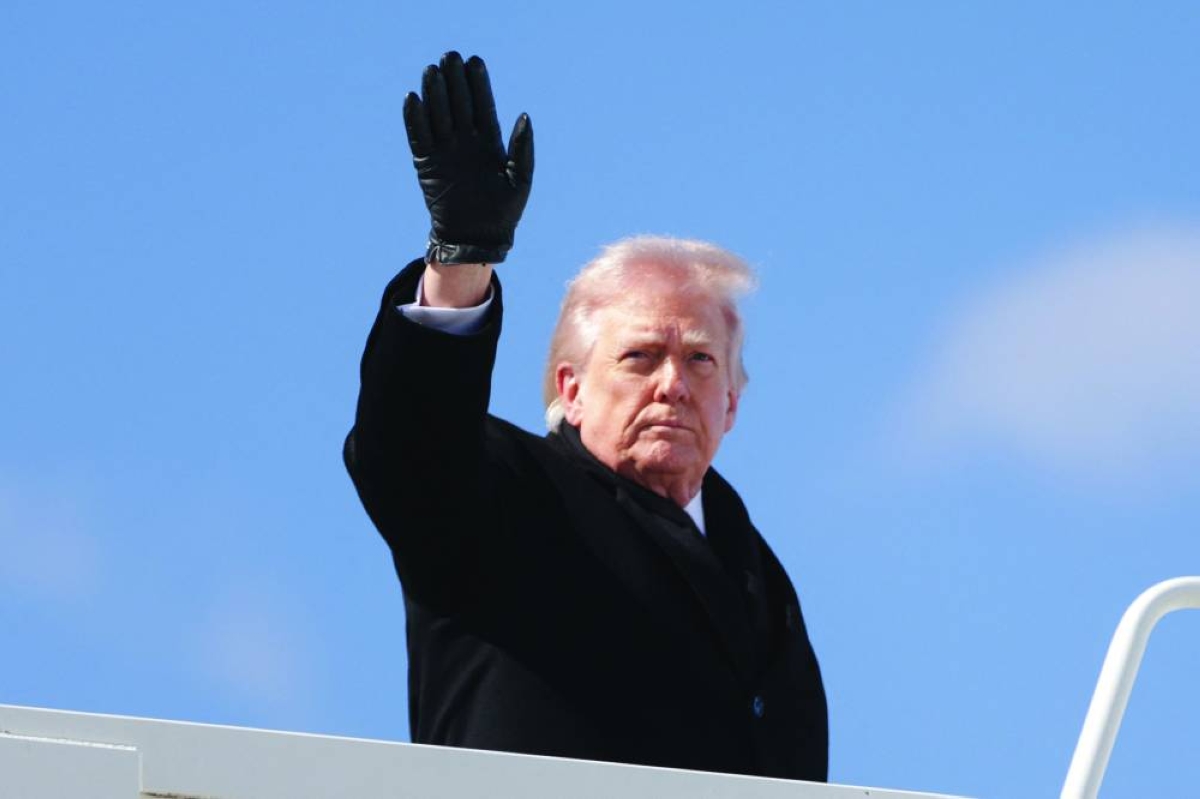 US President Donald Trump waves as he boards Air Force One at Dover Air Force Base Wednesday in Dover, Delaware. (AFP)