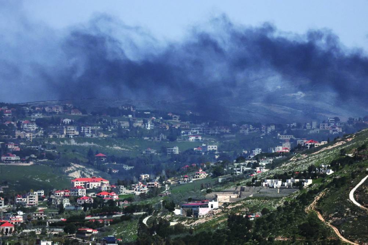 Smoke rises from Khiyam, a Lebanese village near the border with Israel, amid escalation between Hezbollah and Israel, and amid the US-Israeli conflict with Iran, as seen from northern Israel, Wednesday. (Reuters)
