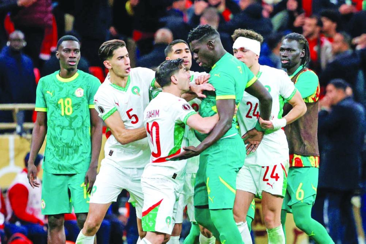 Senegal and Morocco players clash during the Africa Cup of Nations final in Rabat on January 18, 2026. (AFP)