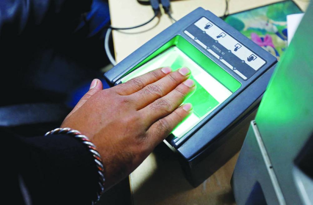 A woman goes through the process of finger scanning for the Unique Identification (UID) database system, also known as Aadhaar, at a registration centre in New Delhi. (Reuters/File Picture)