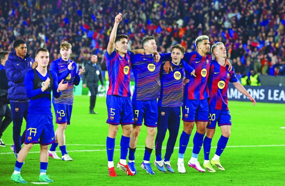 
Barcelona players celebrate after a 7-2 thrashing of Newcastle in the UEFA Champions League round of 16 second leg at Camp Nou in Barcelona. (Reuters) 