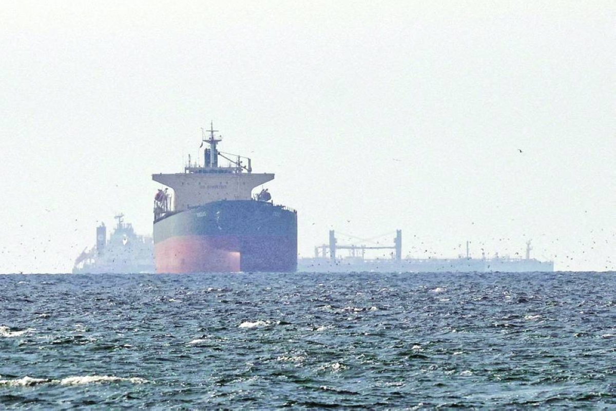 This file picture shows cargo ships in the Gulf, near the Strait of Hormuz, as seen from northern Ras al-Khaimah, near the border with Oman’s Musandam governance last week. – Reuters