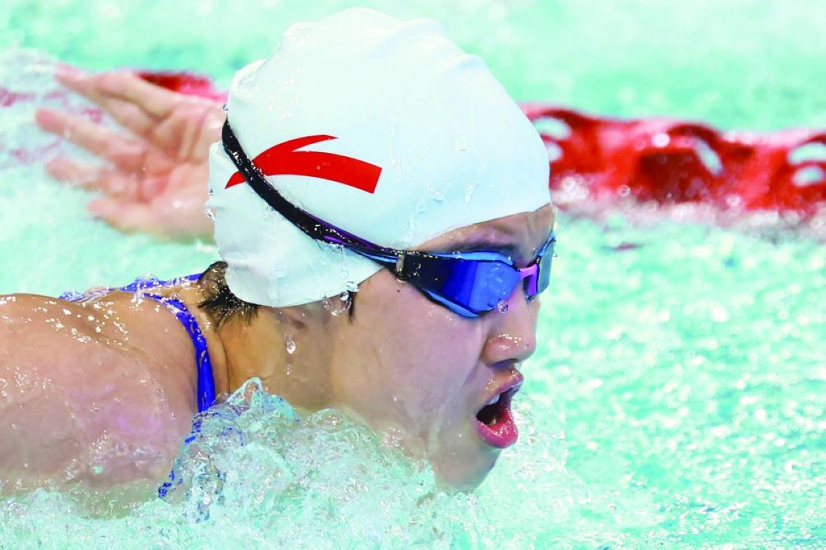 China’s Yu Zidi competes in the women's 200m butterfly final at the China Open Swimming Championships in Shenzhen, in China’s southerm Guangdong province on March 19, 2026. Chinese swimming sensation Yu Zidi added to her fast-growing reputation as the 13-year-old phenomenon beat multiple Olympic medallist Regan Smith in the women's 200m butterfly in a personal-best time in Shenzhen. (AFP)
