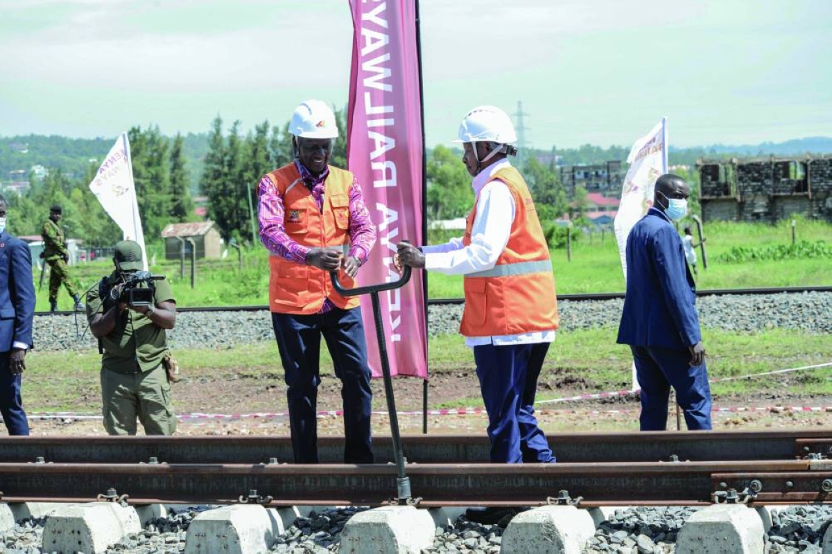 Kenyan President William Ruto (L) and Ugandan President Yoweri Museveni (R) launch construction of the Kisumu-Malaba Standard Gauge Railway (SGR) line in Kisumu, on March 21, 2026. The presidents of Kenya and Uganda met near their shared border Saturday to mark the multi-billion-dollar, long-delayed extension of a Chinese-built railway that has left Kenya heavily in debt.
The Standard Gauge Railway, built from 2013 to 2019, connects the Kenyan port of Mombasa to its capital Nairobi, and on to the lake town of Naivasha, but China refused further lending before it could be extended to Uganda as planned. (AFP)